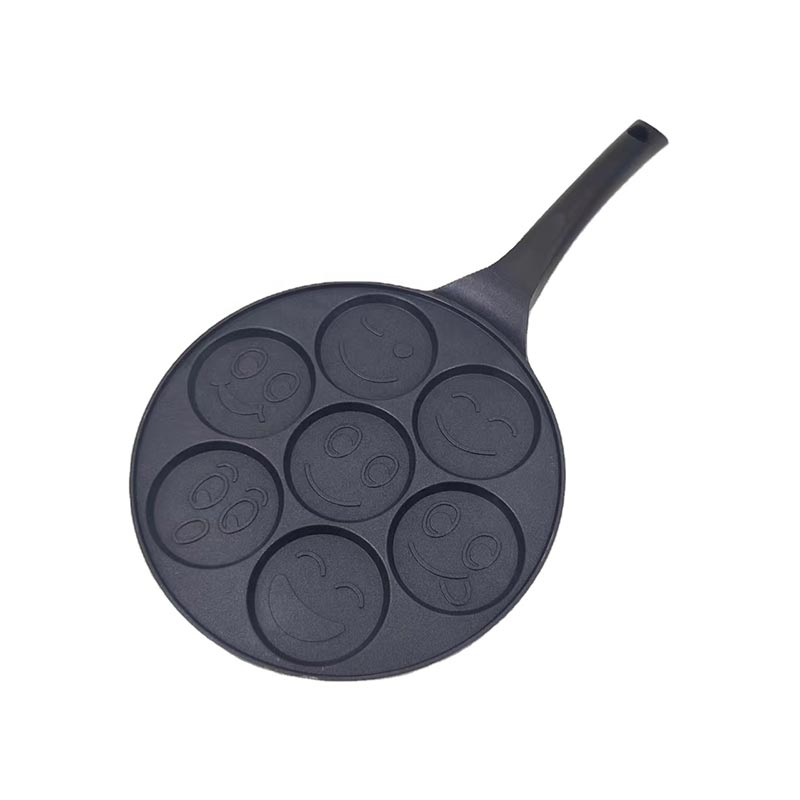 Piatto da forno con faccina sorridente a sette fori
